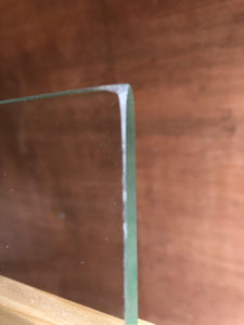 Unpolished edge on toughened glass